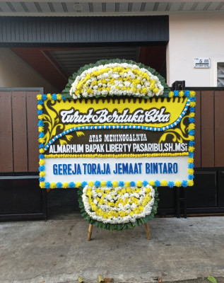 Papan Bunga Duka di Pane